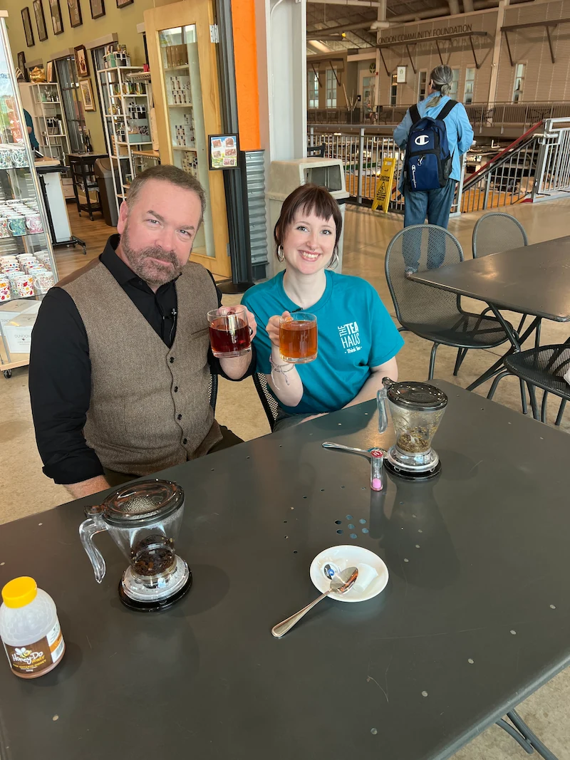 host drinking tea
