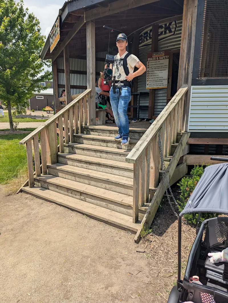 cameraman walking down stairs